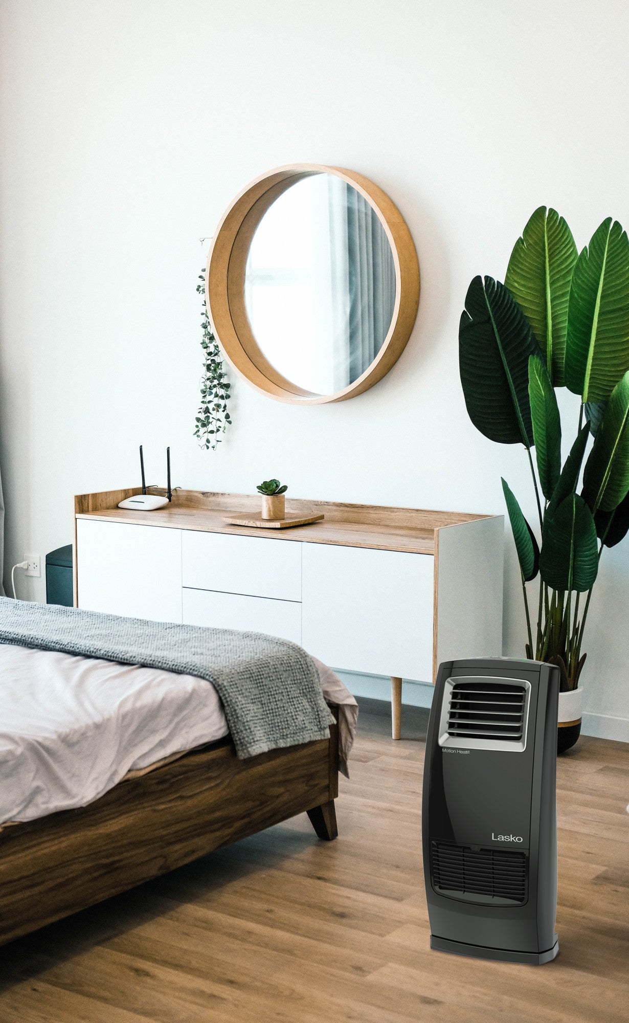 Lasko 1500W Motion Heat Whole Room Ceramic Space Heater with Remote, CC23161, Black